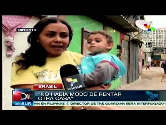 Habitantes de favela Moinho derriban "muro de la vergüenza"